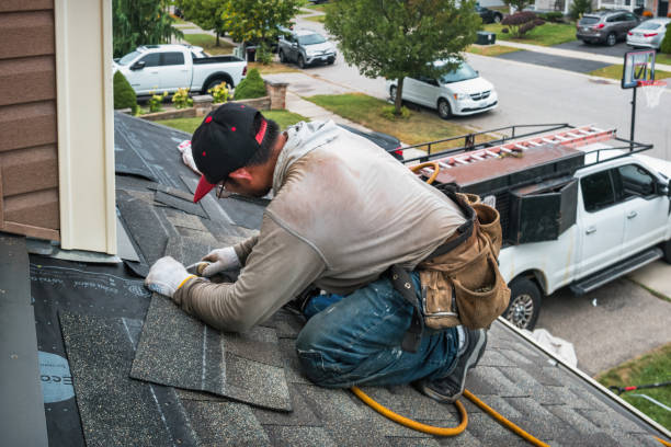 Professional Commercial Roofing technician working in Prairie Lea, TX